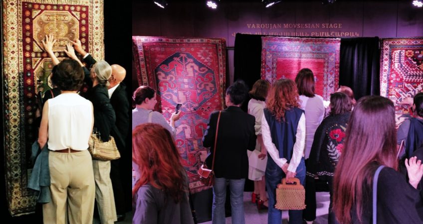 Visitors viewing Armenian carpets at the Lark Musical Society exhibition